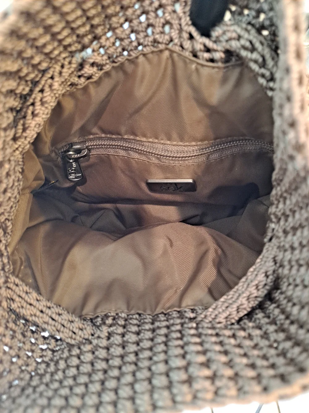 The Sak Brown Crochet Drawstring Mini Backpack